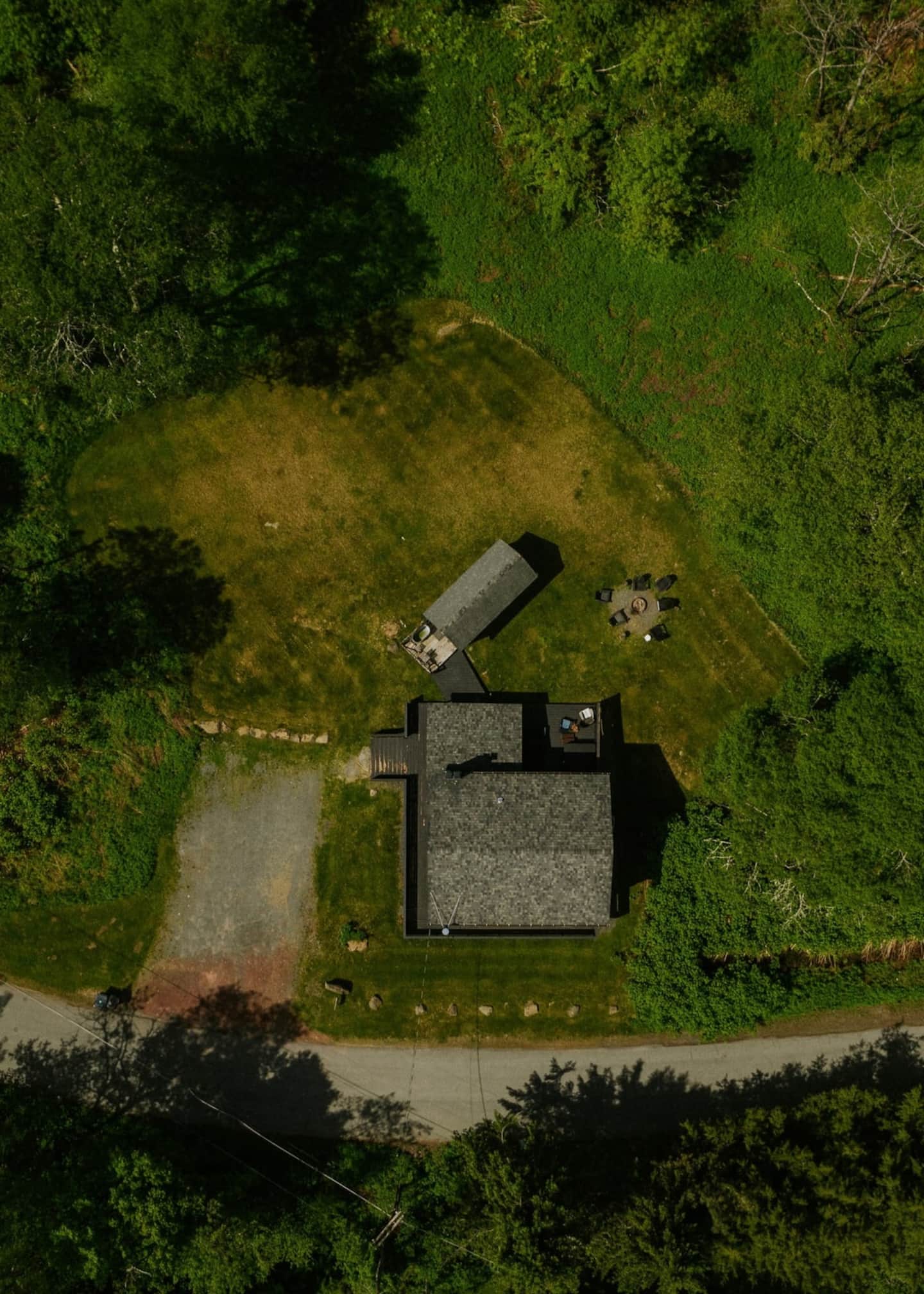 Aerial view of Black Bear Cottage on three wooded acres