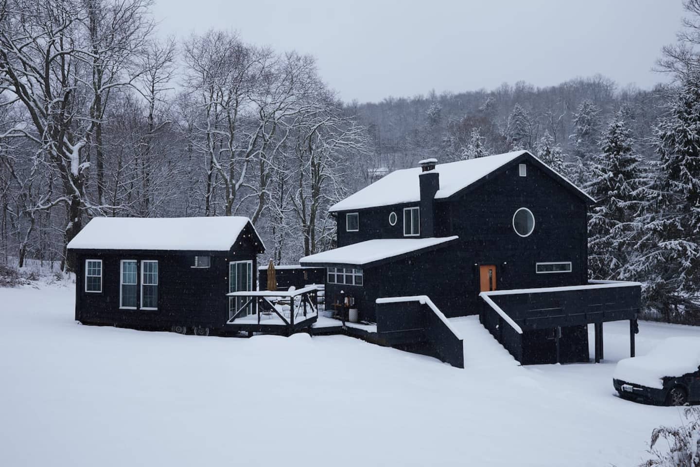 The cottage and tiny house under fresh snow
